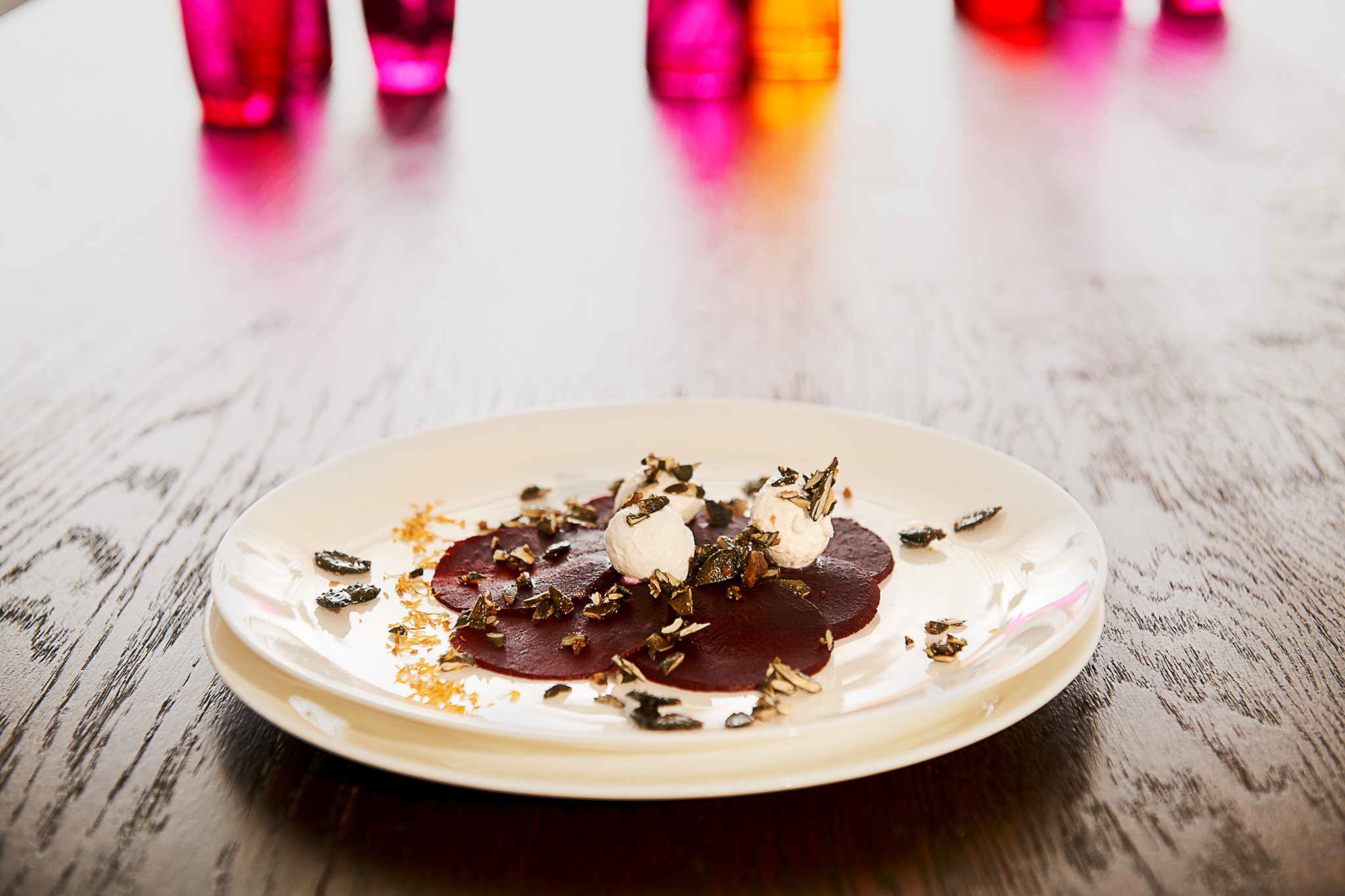 Beet carpaccio with goat’s cheese and pumpkin seed crunch