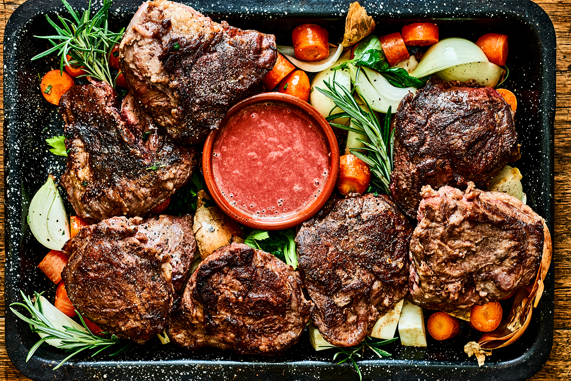 Braised veal cheeks (dark meat stock)