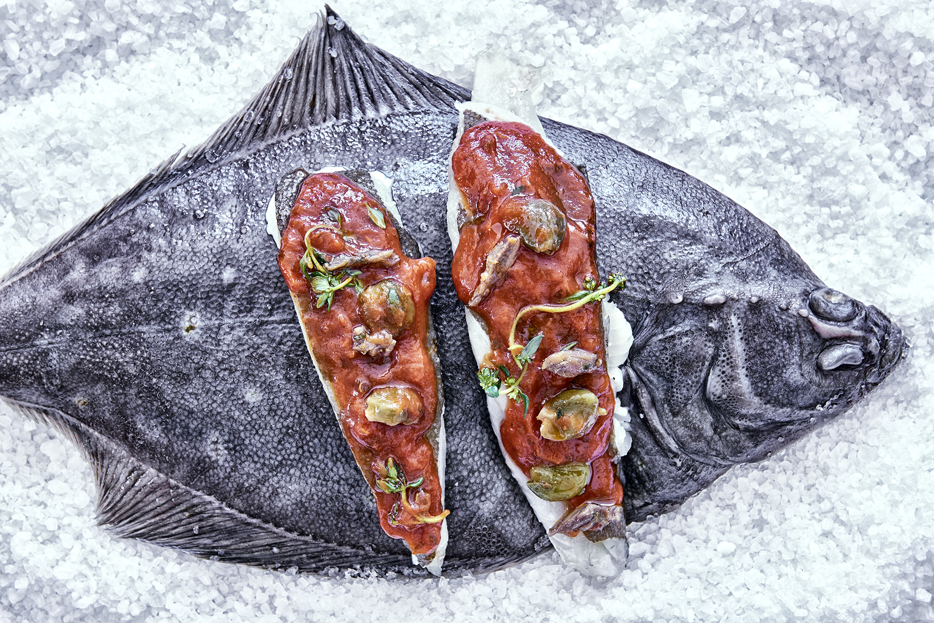 Flounder with capers, tomatoes and anchovies