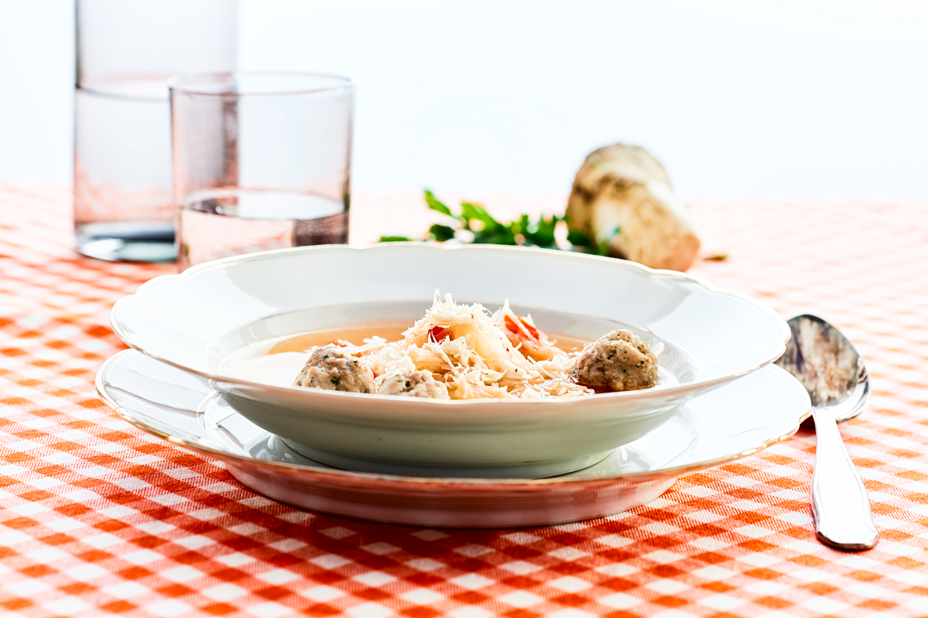 Sauerkraut soup with sausage dumplings and horseradish